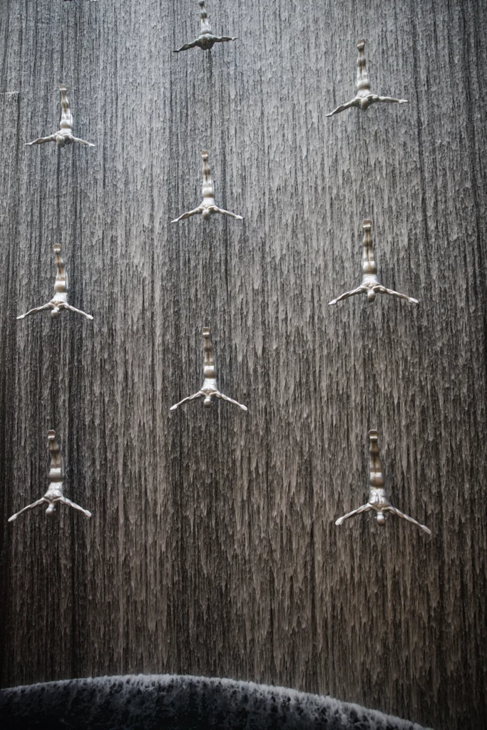 Diving Sculptures at the Dubai Mall Waterfall