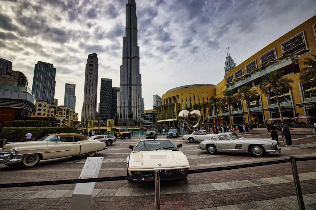Classic Cars Parked with Burj Khalifa in the Background – Dubai