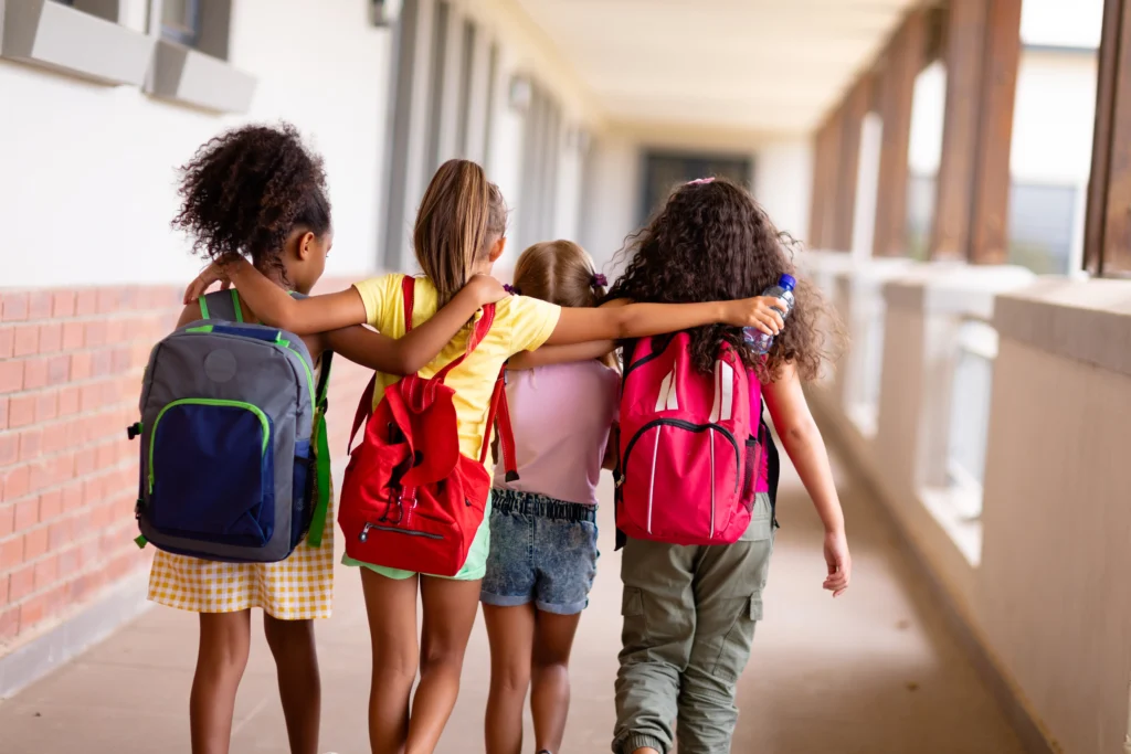 Children learning and interacting in a school setting — cinematic storytelling by DICAPLO